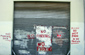 No parking on a big garage door spray painted all over the wall
